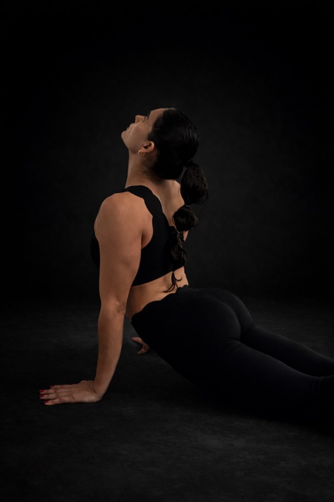 Pamela holding a strong yoga pose